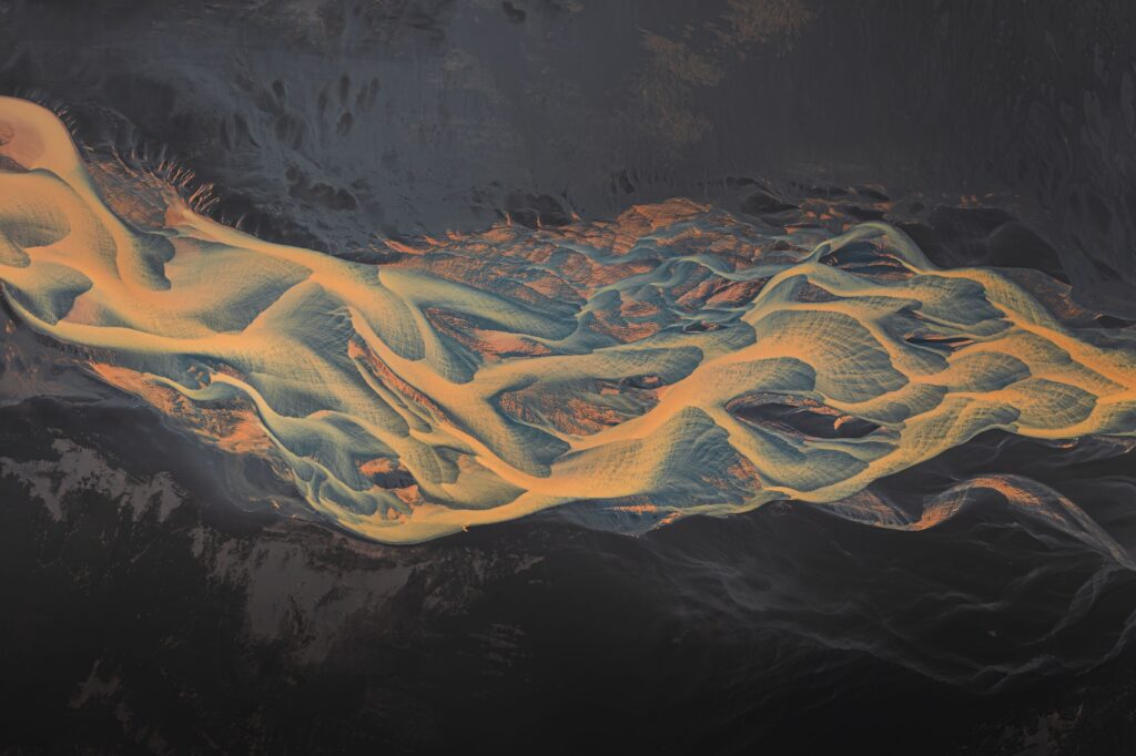 aerial view of a vibrant river delta with intricate patterns